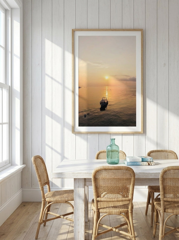 Modern wall art print styled on the wall in a coastal dining room