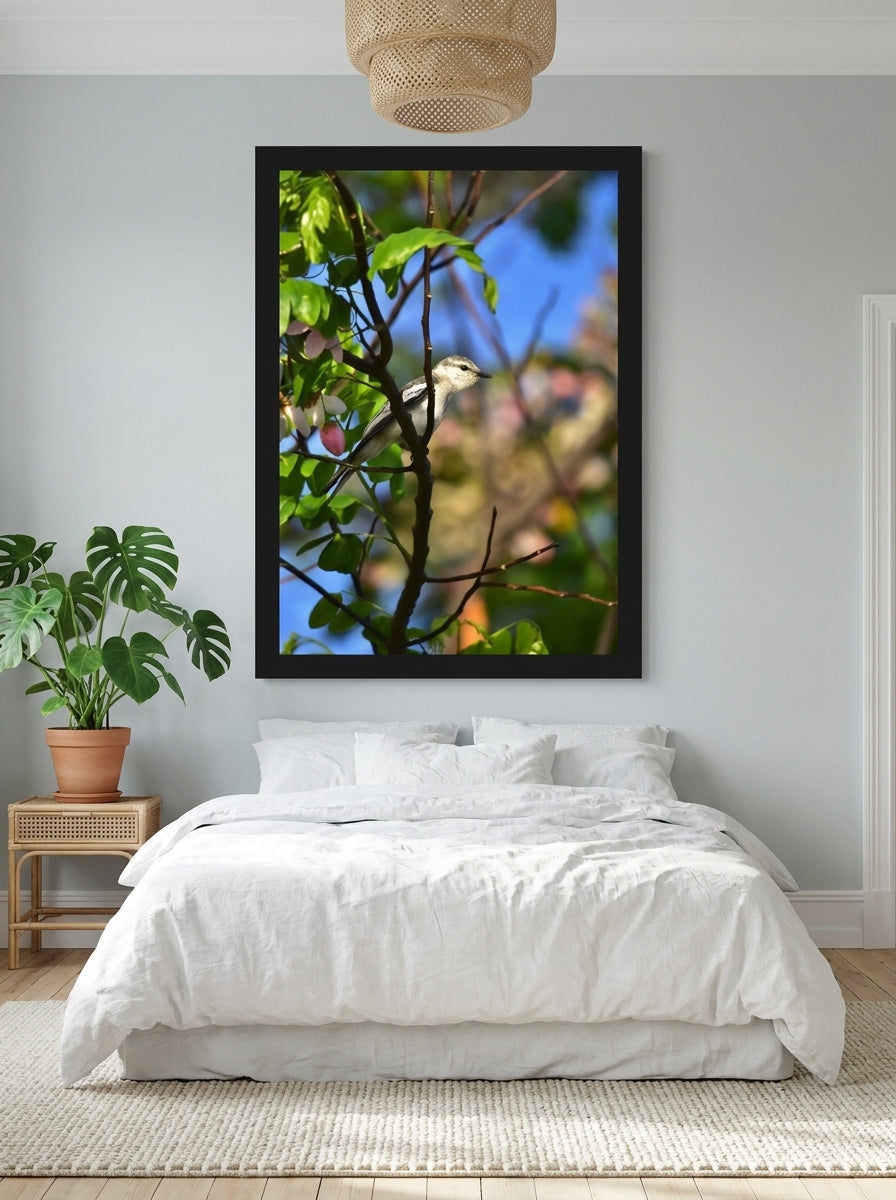 Oversized statement modern wall art print styled on the wall in a bright Scandinavian bedroom