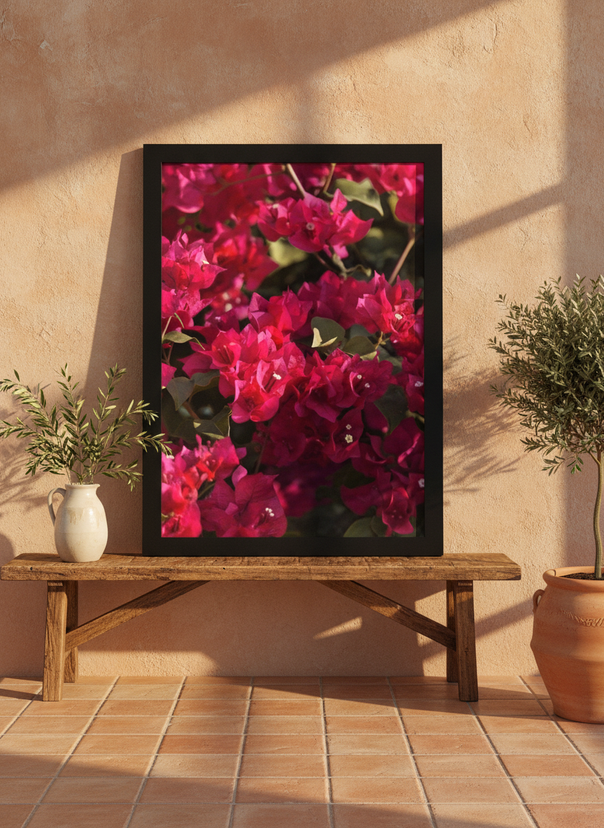 Modern wall art print standing on a bench in a Mediterranean bedroom