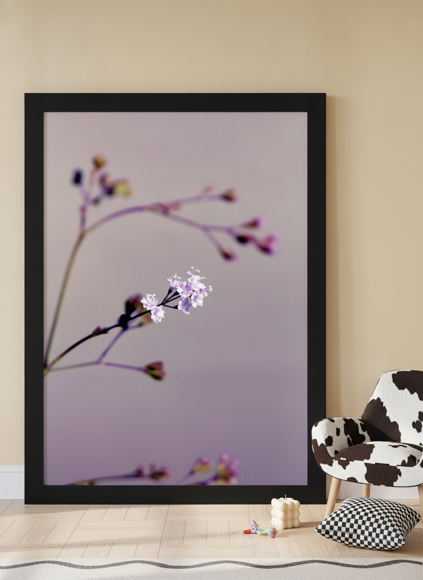 Oversized statement modern wall art print leaning against the wall in a colourful eclectic nursery