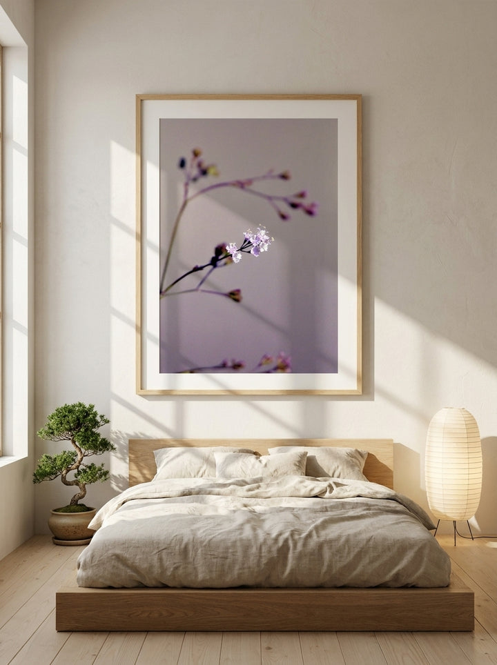 Modern wall art print styled on the wall in a warm Japandi bedroom
