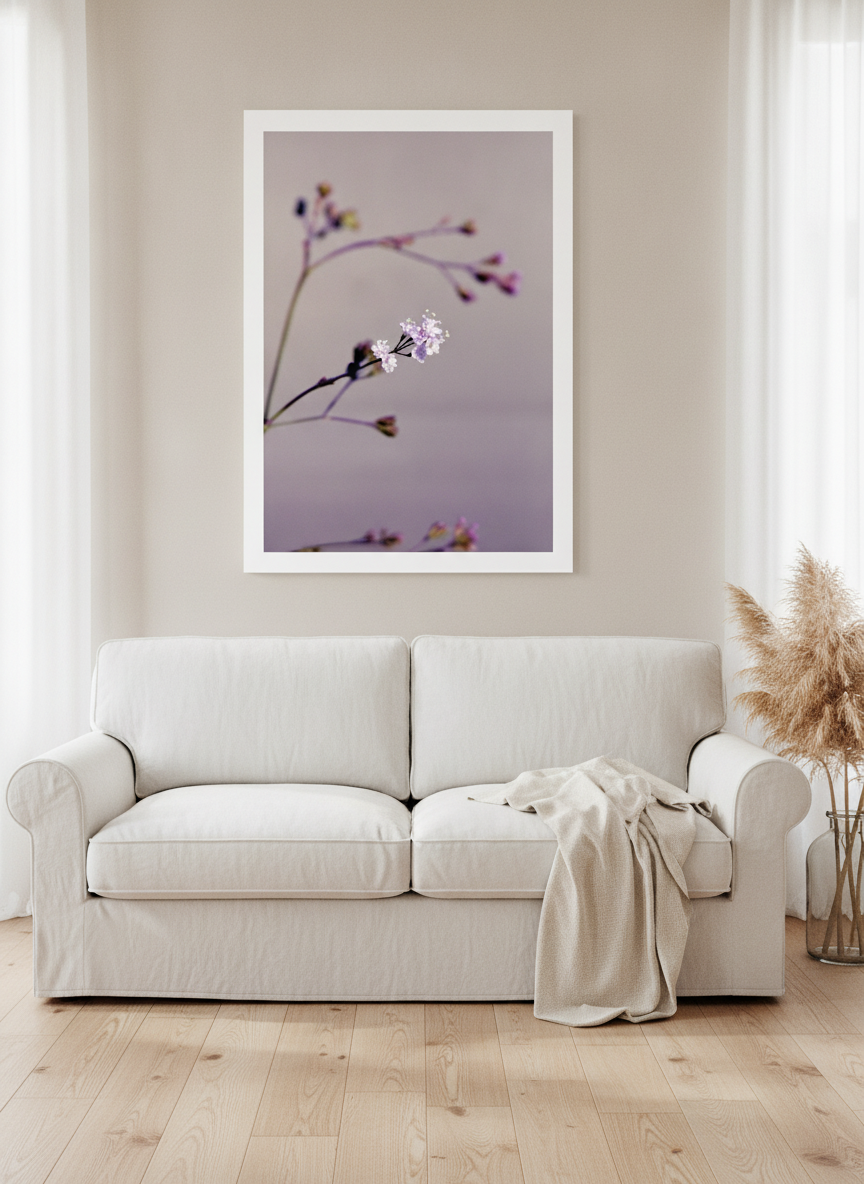 Oversized statement modern wall art print styled on the wall in a coastal living room