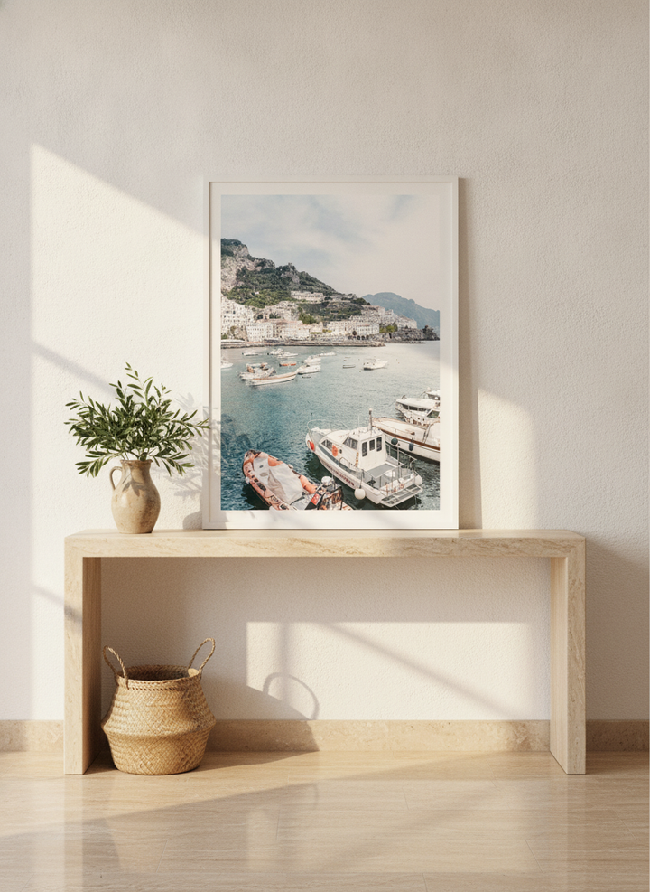 Modern wall art print standing on a console in a Mediterranean dining room