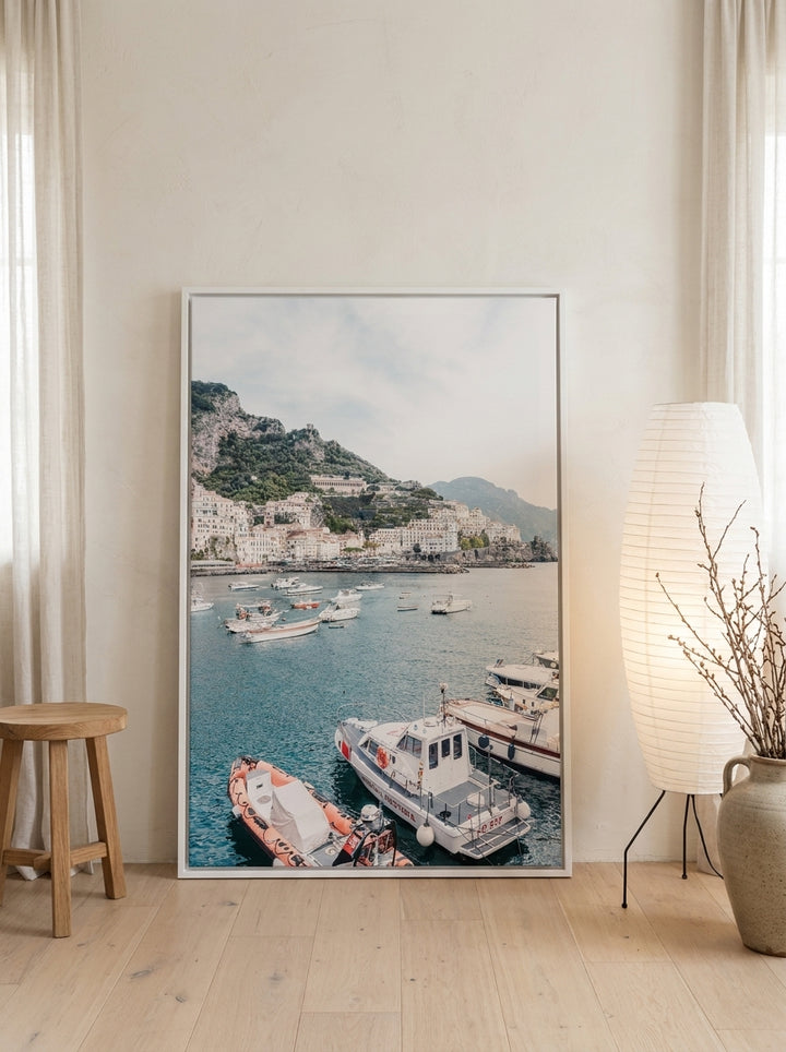 Canvas wall art with a white surround leaning against the wall in a warm Japandi bathroom