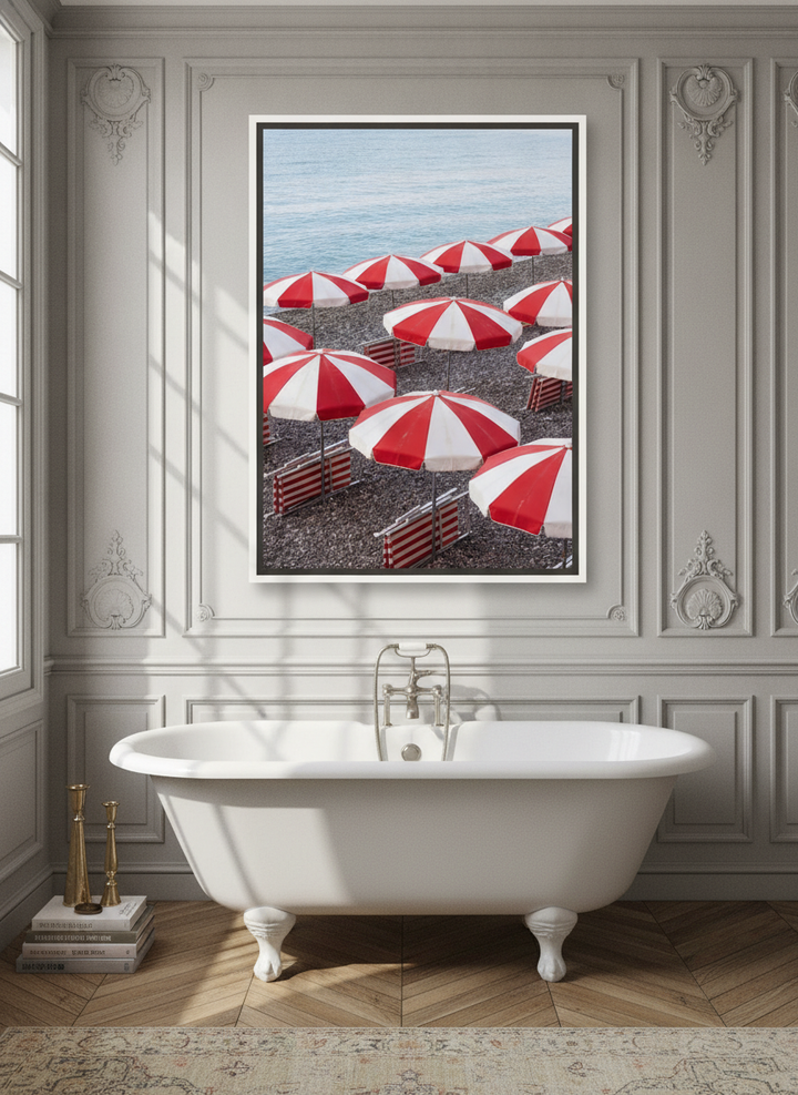 Canvas wall art with a white surround styled on the wall in a Parisian bathroom