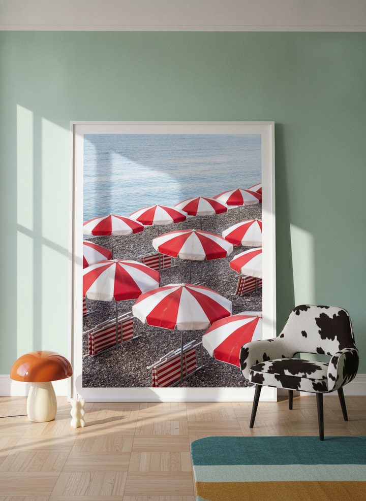 Oversized statement modern wall art print leaning against the wall in a colourful eclectic living room