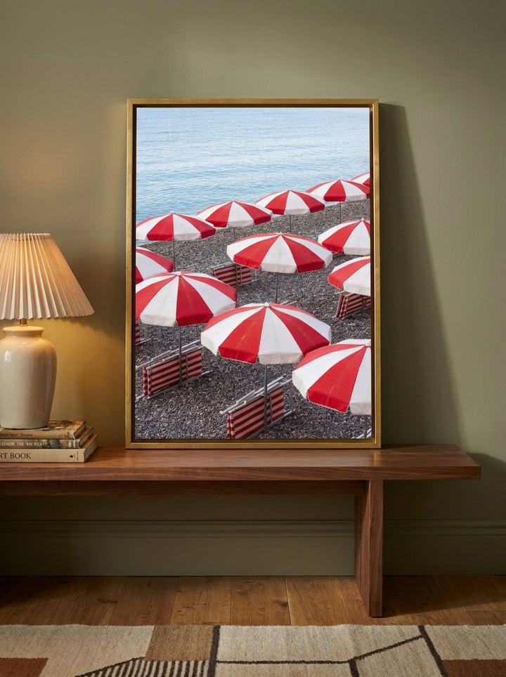 Canvas wall art with a gold leaf surround standing on a kitchen bench in a mid-century kitchen