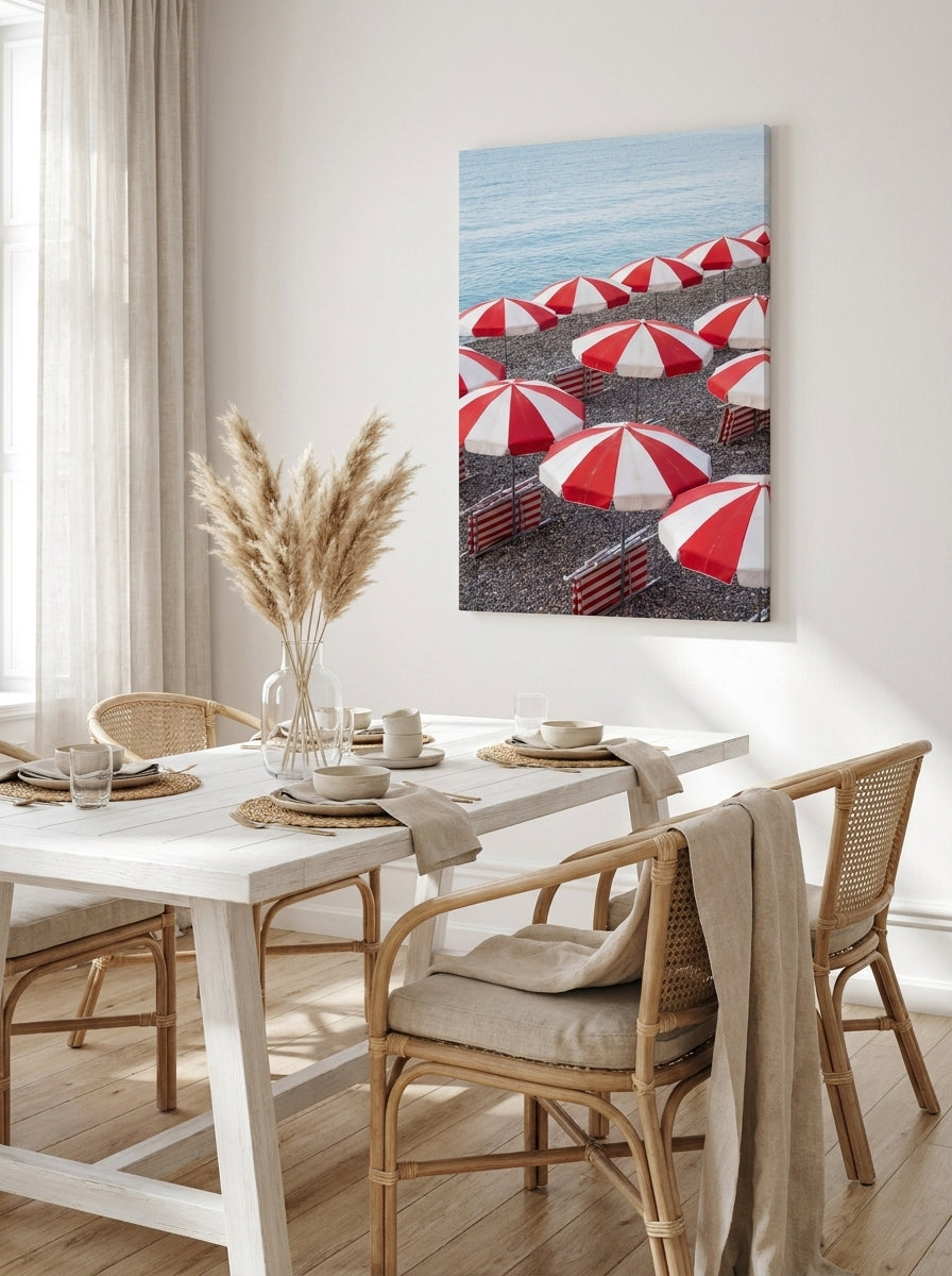 Stretched canvas wall art styled on the wall in a coastal dining room