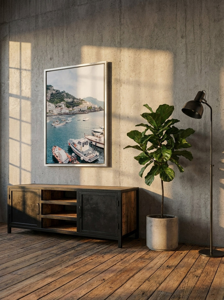 Canvas wall art with a silver leaf surround styled on the wall in an industrial loft living room