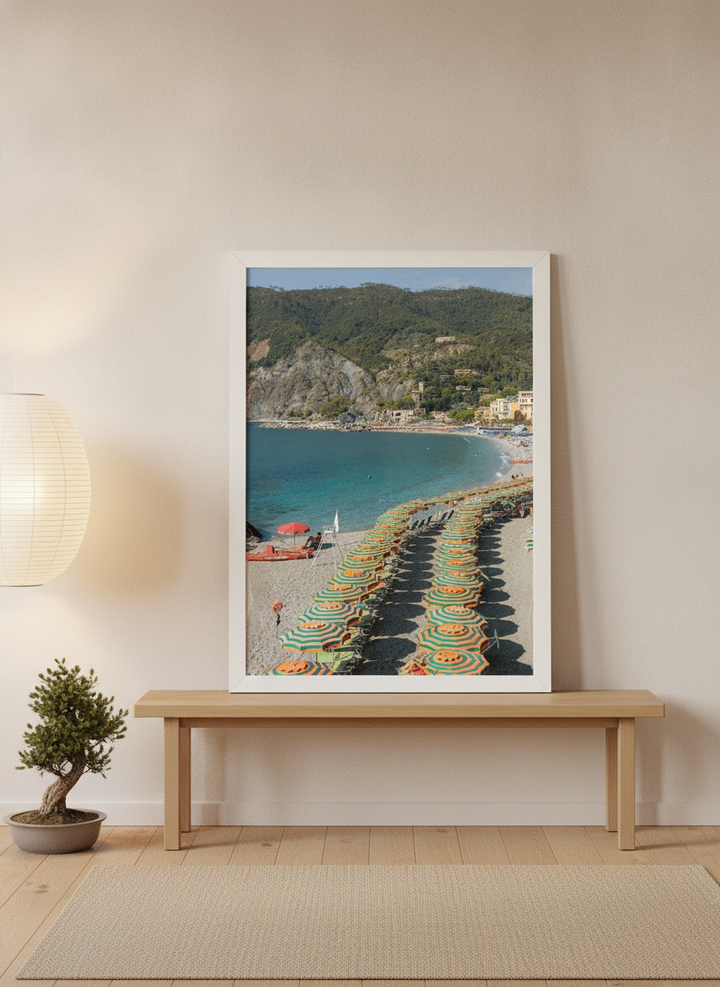 Modern wall art print standing on a bench in a warm Japandi bedroom