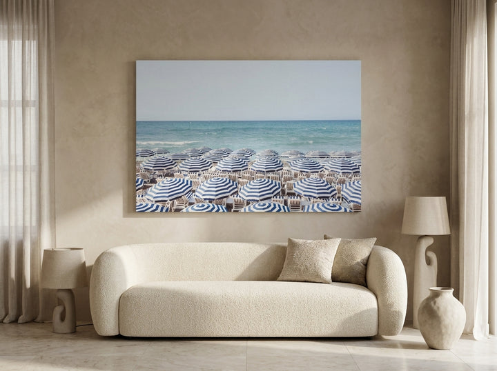 Stretched canvas wall art styled on the wall in a luxe living room