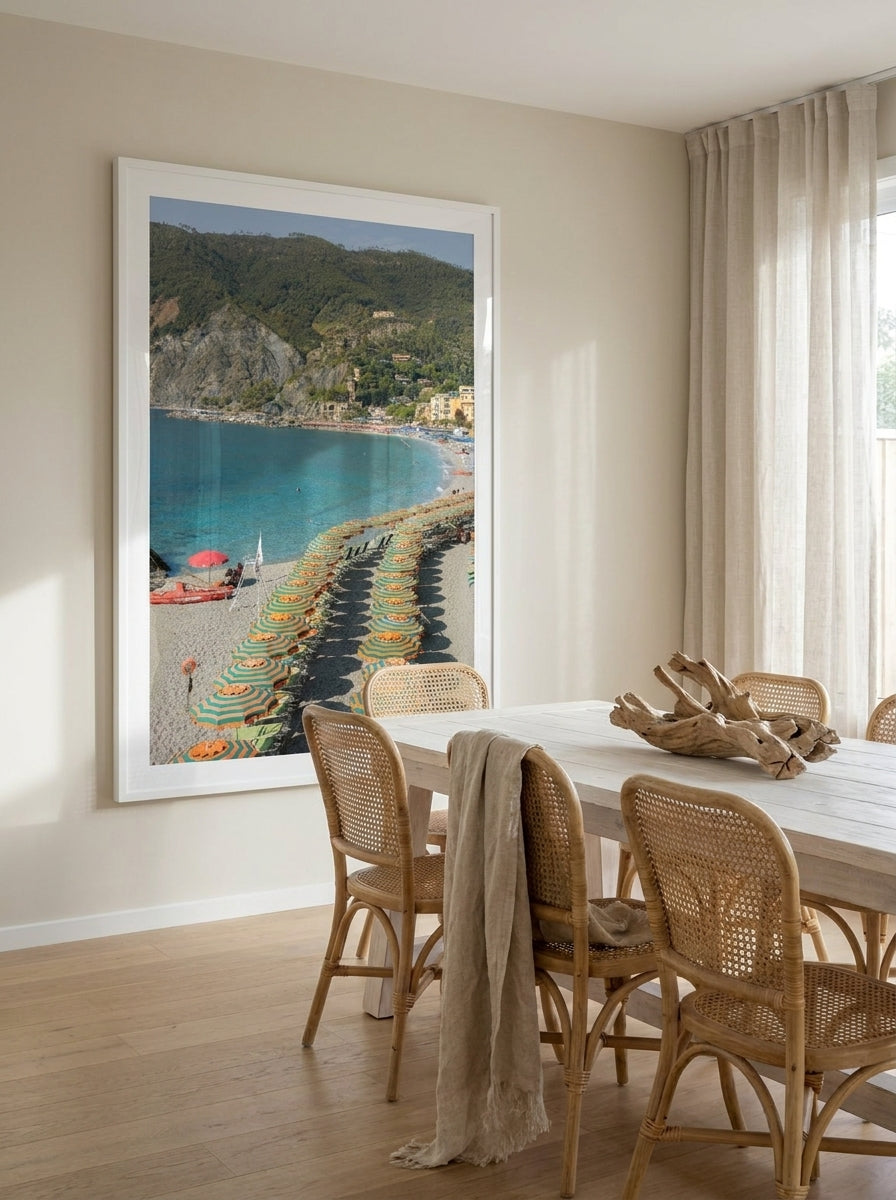 Oversized statement modern wall art print styled on the wall in a coastal dining room