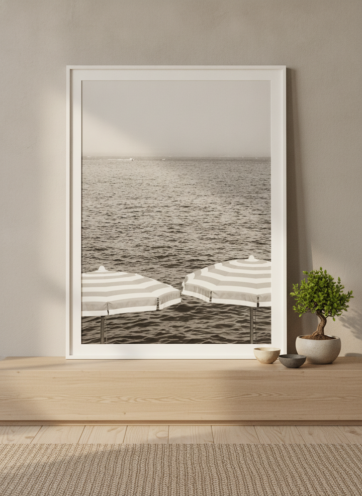 Modern wall art print standing on a sideboard in a warm Japandi bedroom