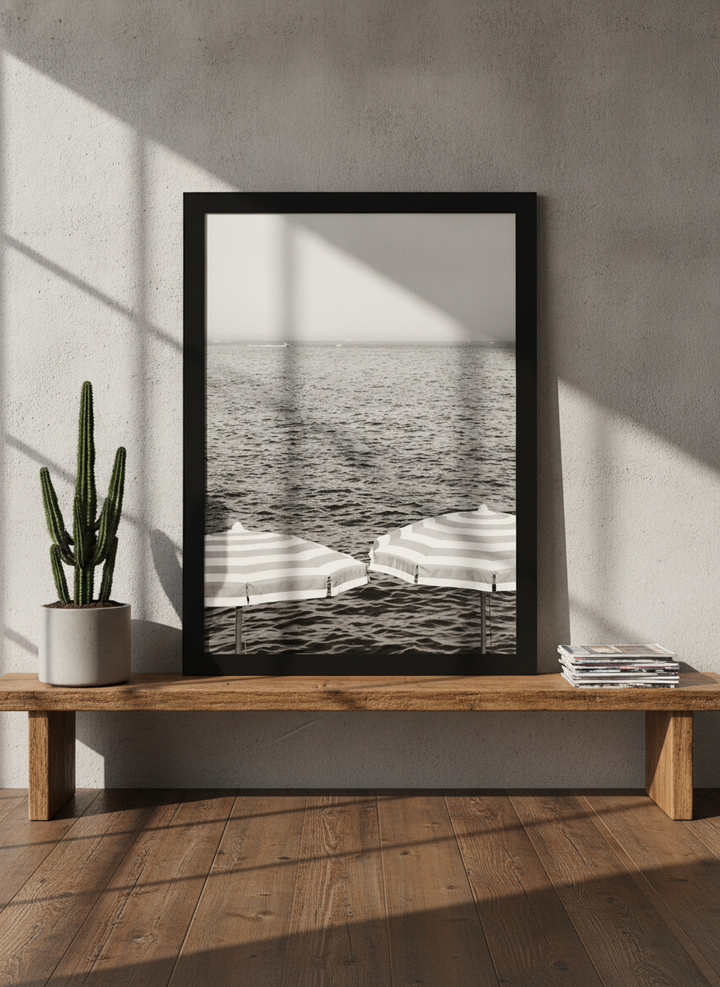Modern wall art print standing on a bench in an industrial loft home office