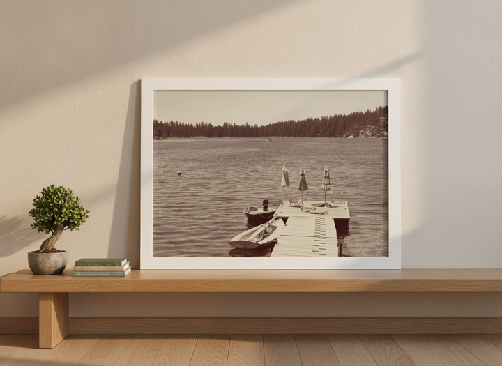 Modern wall art print standing on a bench in a warm Japandi bedroom