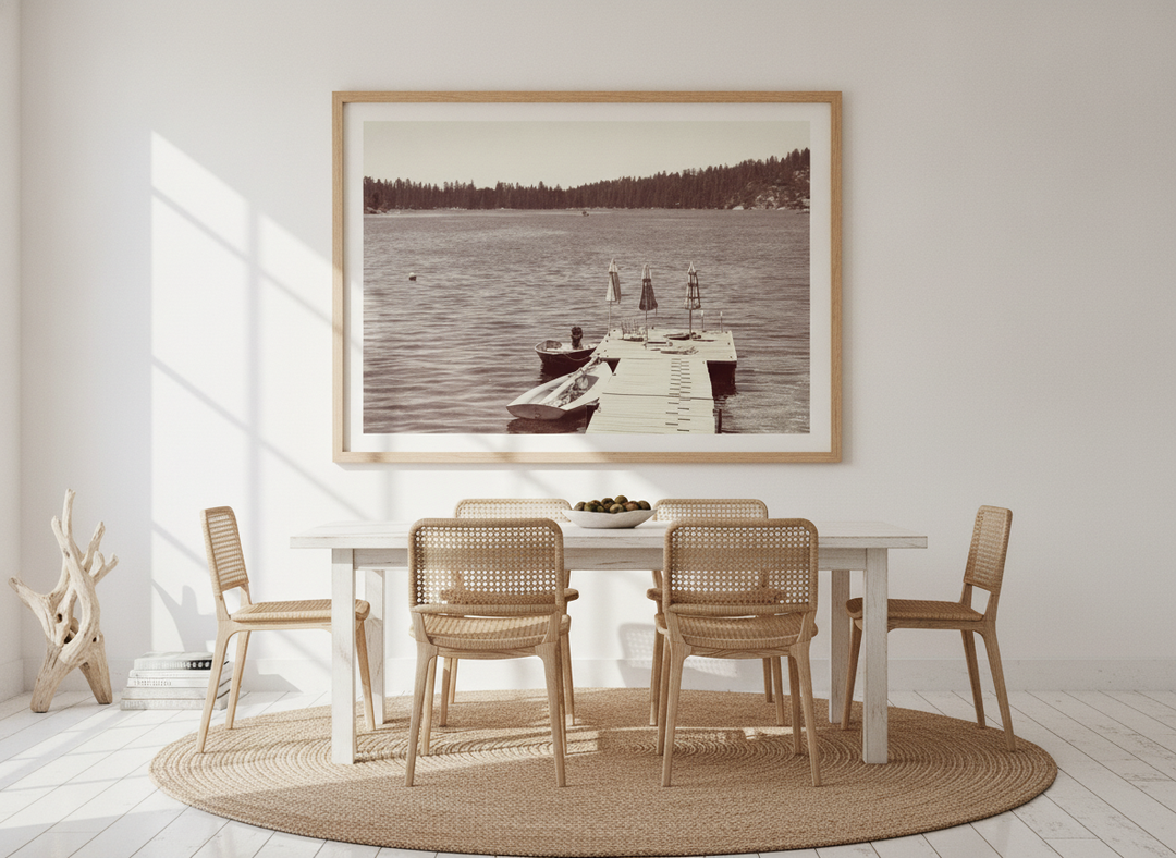 Oversized statement modern wall art print styled on the wall in a coastal dining room