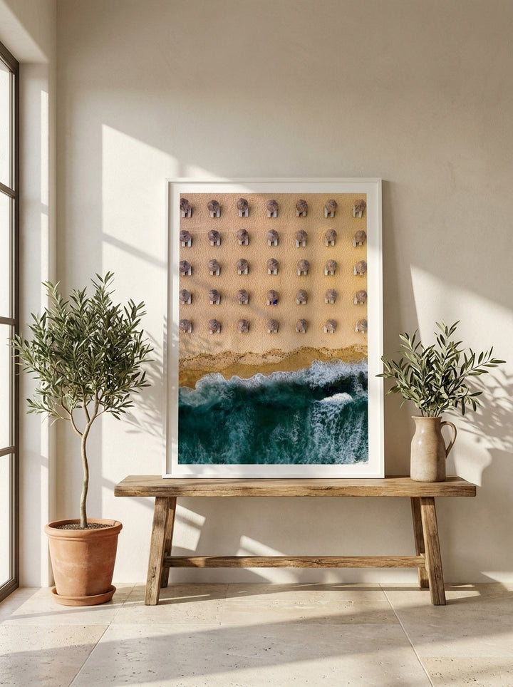 Modern wall art print standing on a bench in a Mediterranean home office