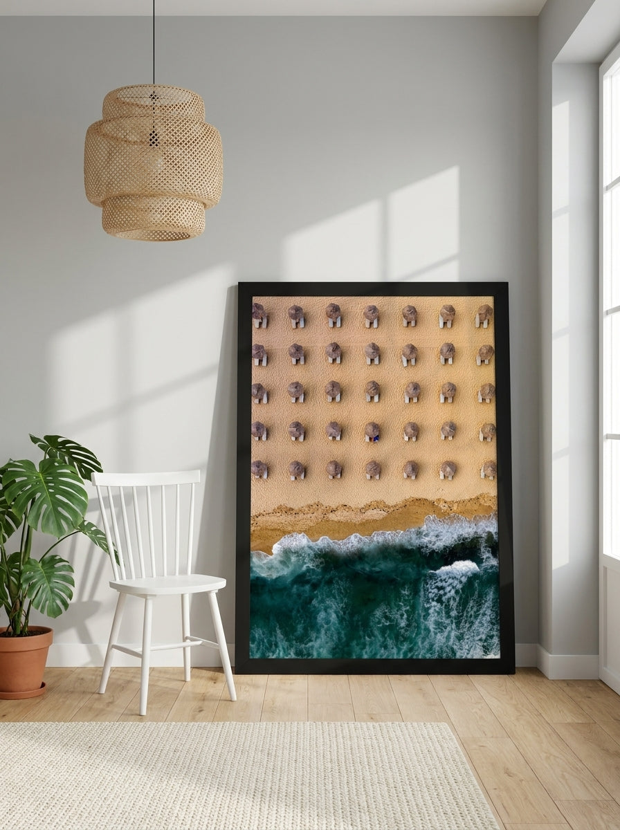 Oversized statement modern wall art print leaning against the wall in a bright Scandinavian living room