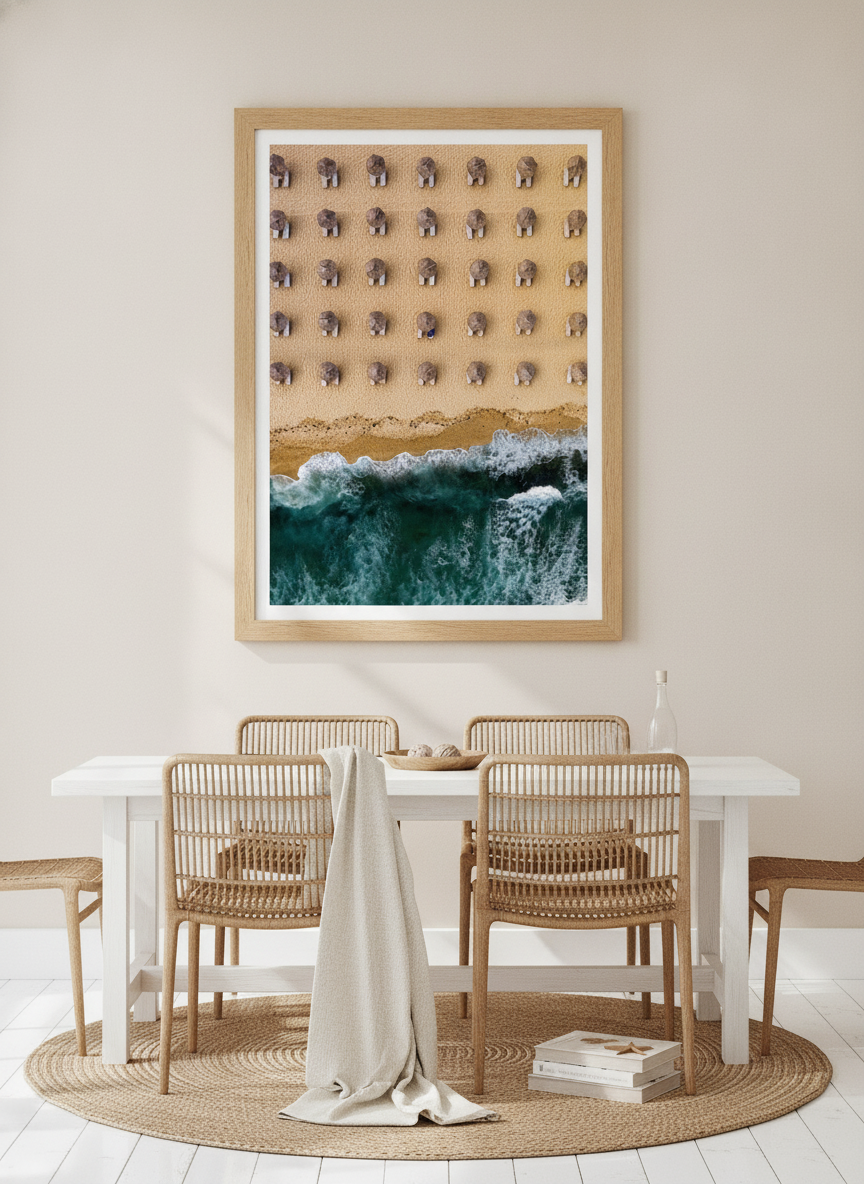 Modern wall art print styled on the wall in a coastal dining room