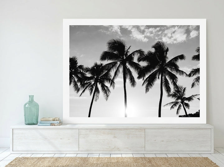 Modern wall art print standing on a console in a coastal bedroom