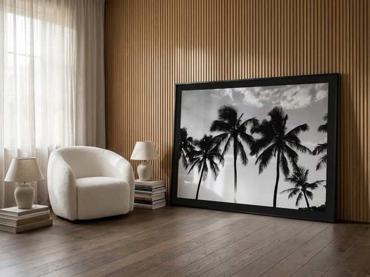 Oversized statement modern wall art print leaning against the wall in a luxe bedroom