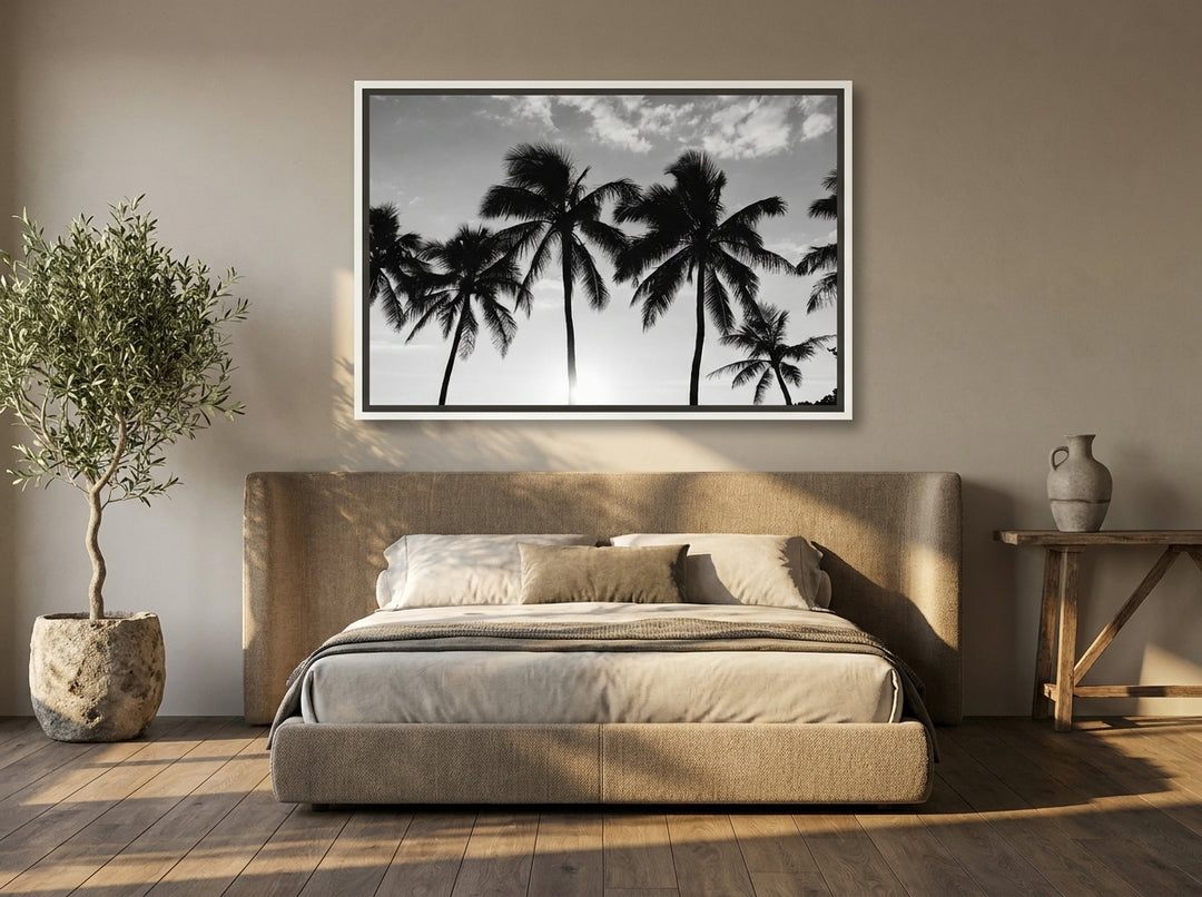 Oversized statement canvas wall art with a white surround styled on the wall in a luxe bedroom