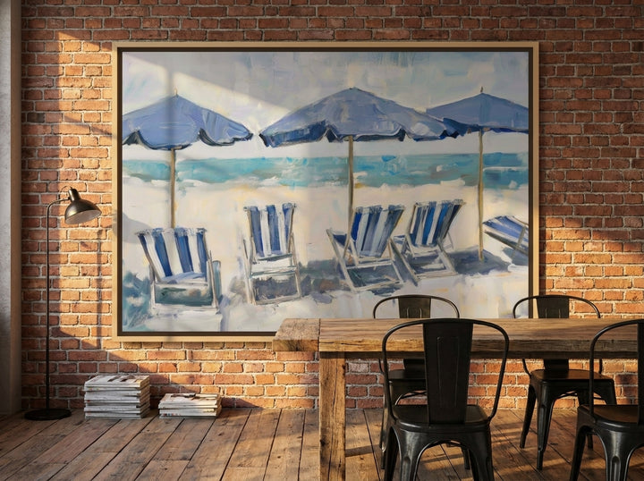 Oversized statement canvas wall art with a natural timber surround styled on the wall in an industrial loft dining room