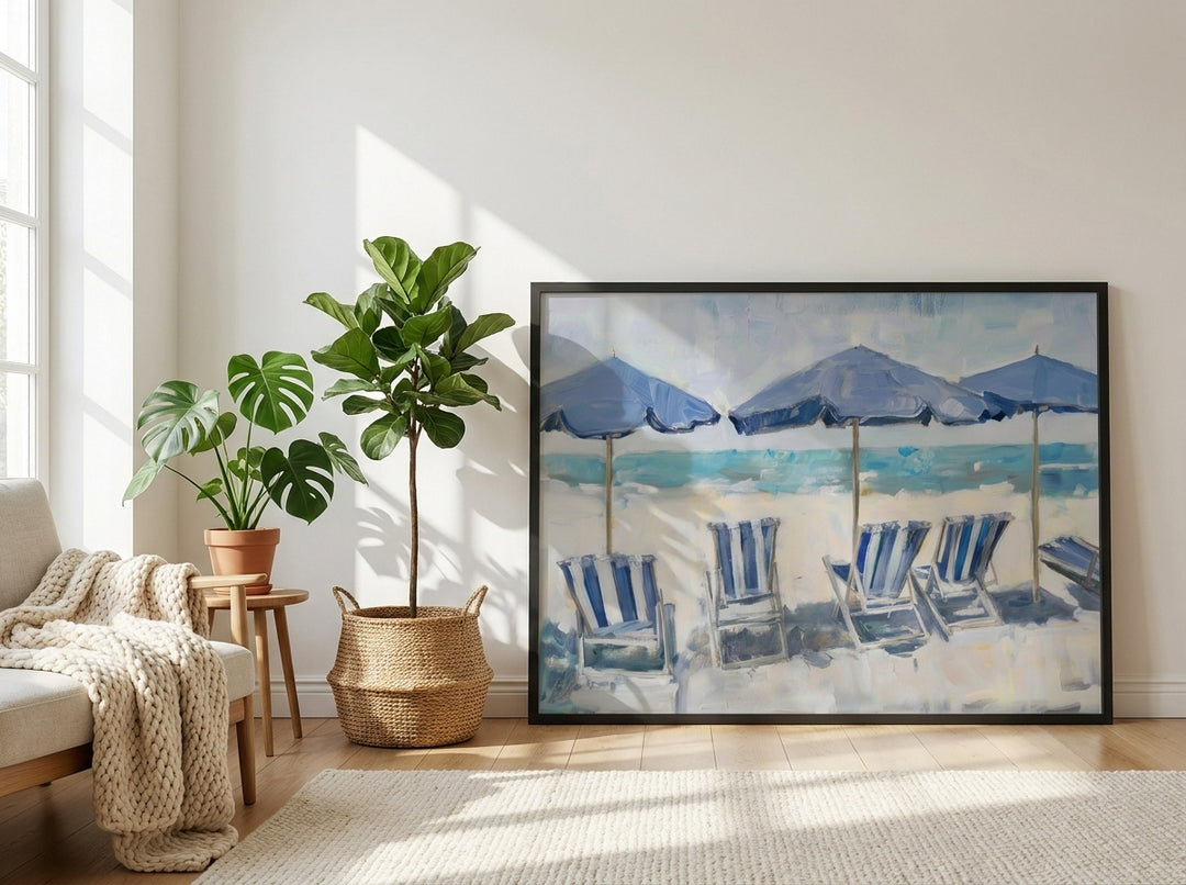 Oversized statement modern wall art print leaning against the wall in a bright Scandinavian living room