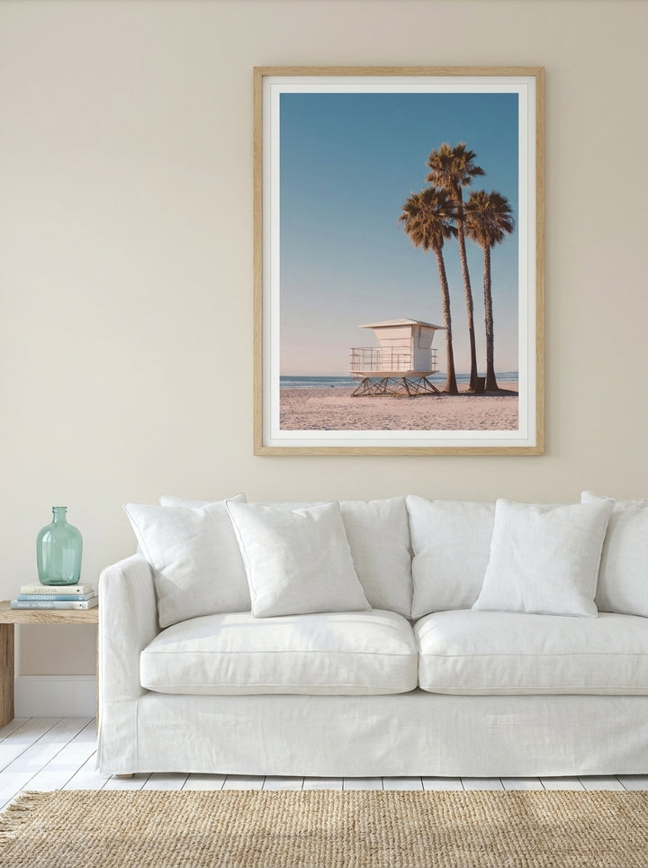 Modern wall art print styled on the wall in a coastal living room