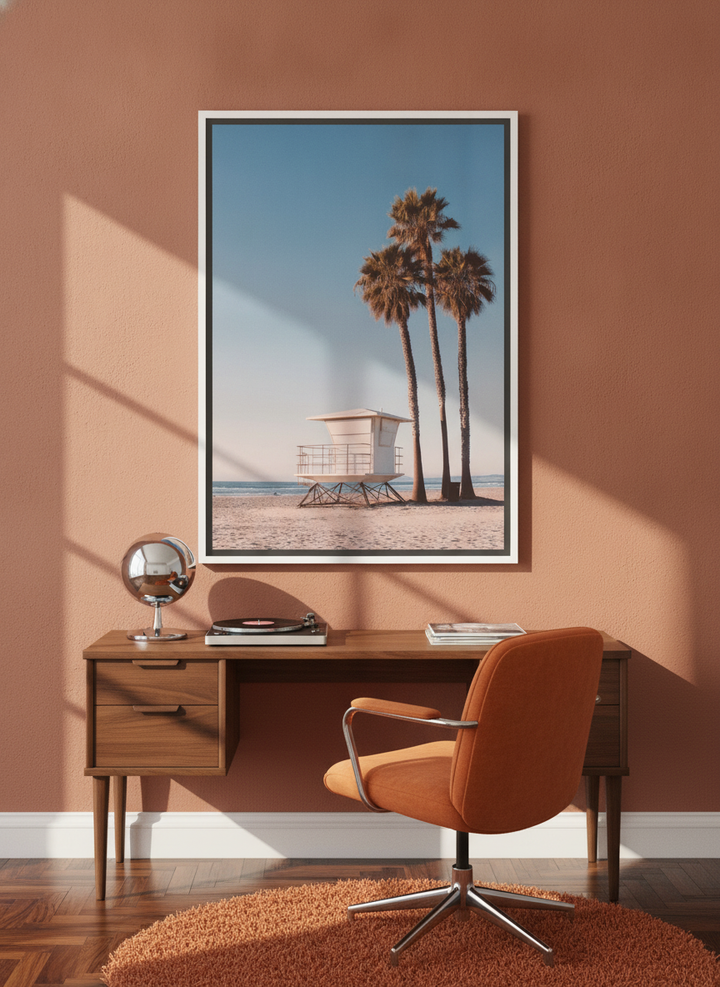 Canvas wall art with a white surround styled on the wall in a retro 70s home office