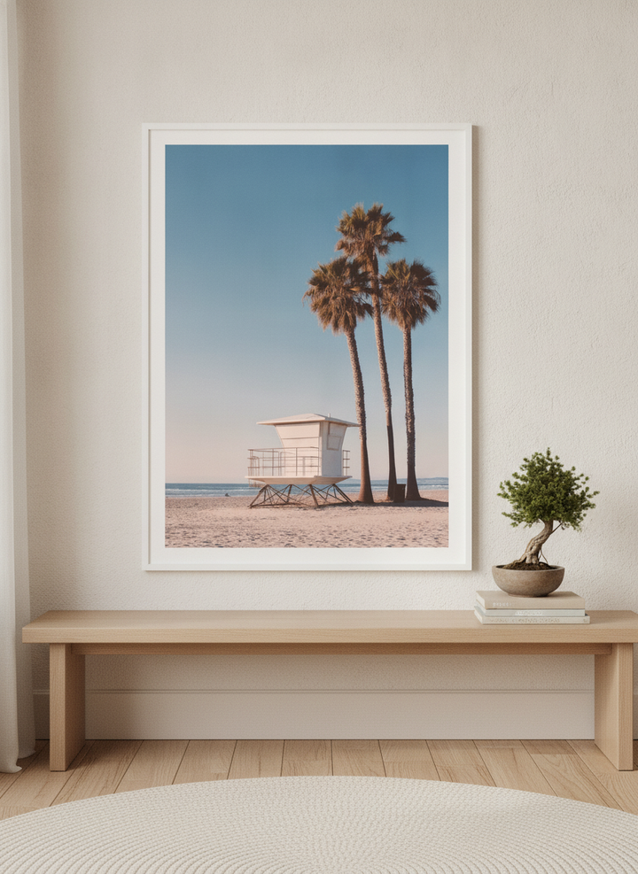 Modern wall art print standing on a bench in a warm Japandi bedroom