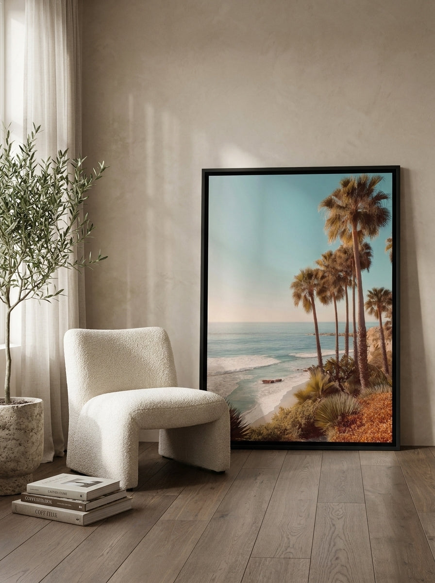 Canvas wall art with a black surround leaning against the wall in a luxe bedroom