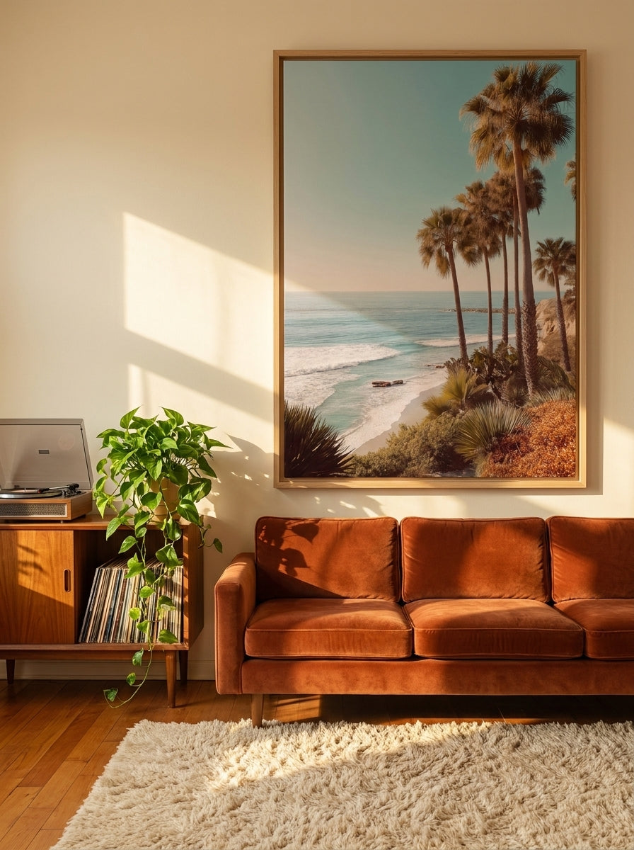 Oversized statement canvas wall art with a natural timber surround styled on the wall in a retro 70s living room