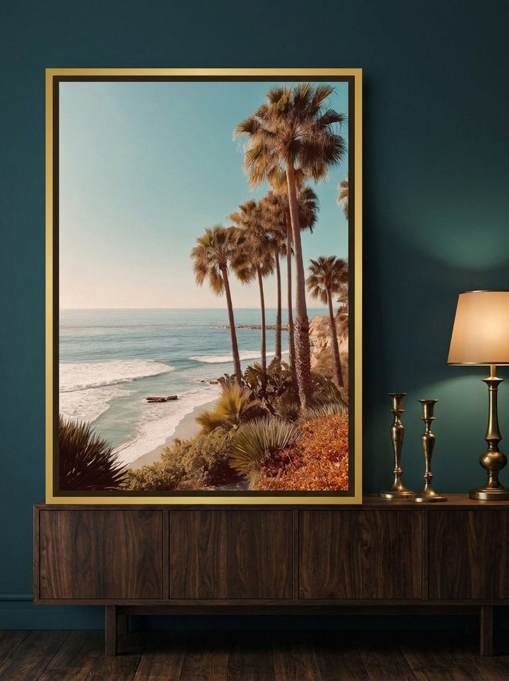 Canvas wall art with a gold leaf surround standing on a sideboard in a moody home office