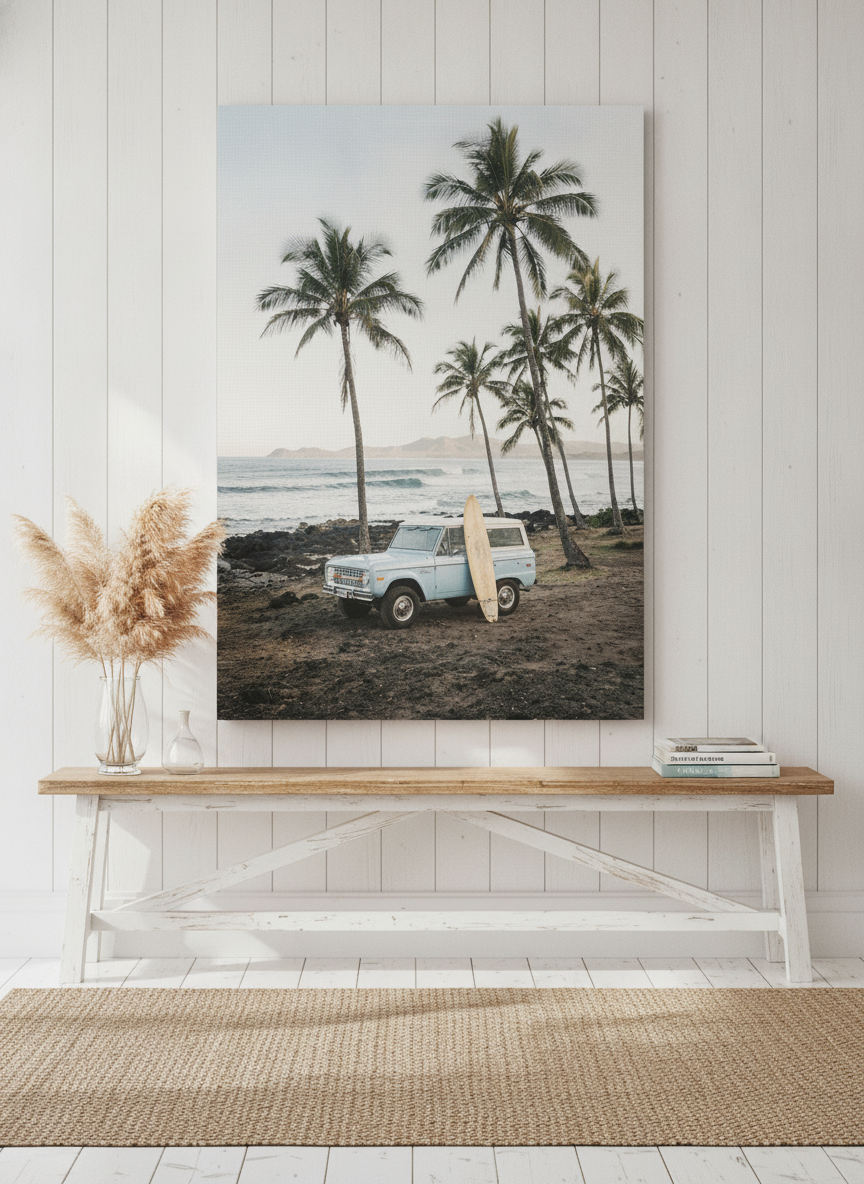 Stretched canvas wall art standing on a console in a coastal dining room