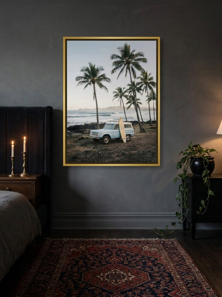 Canvas wall art with a gold leaf surround styled on the wall in a moody bedroom