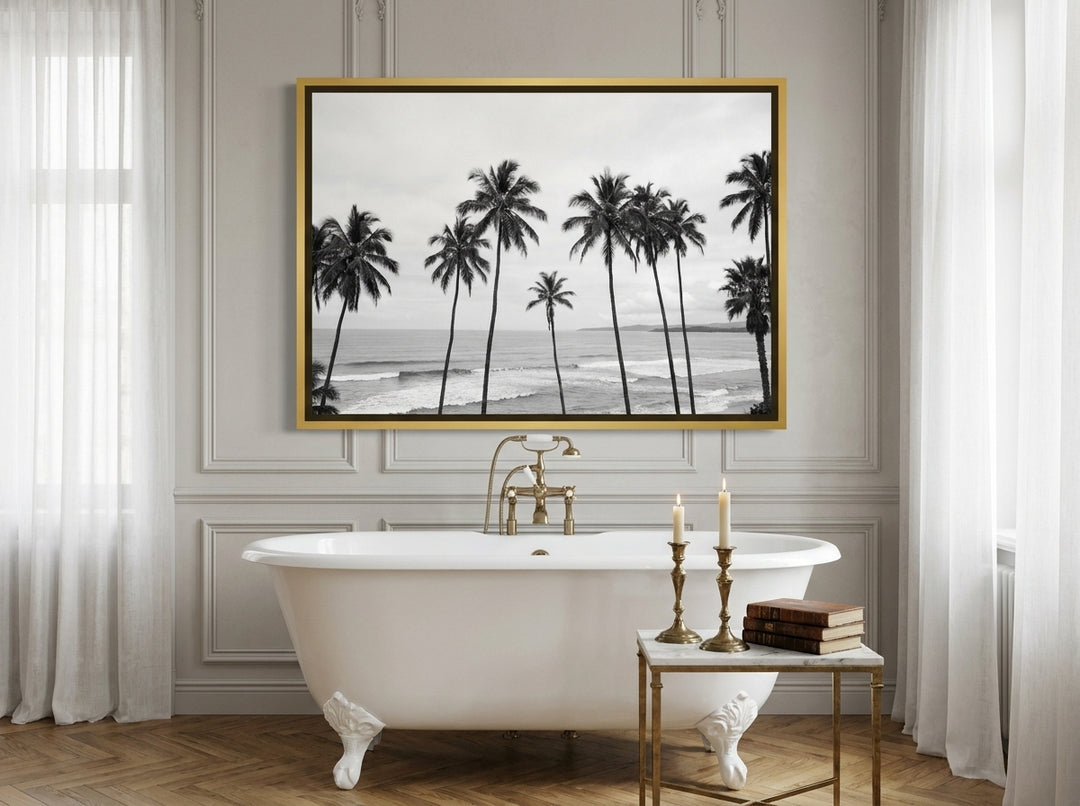 Canvas wall art with a gold leaf surround styled on the wall in a Parisian bathroom