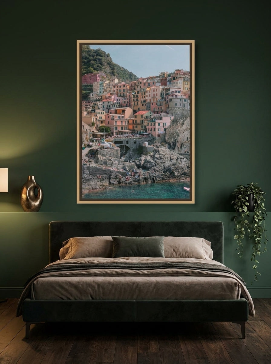 Canvas wall art with a natural timber surround styled on the wall in a moody bedroom