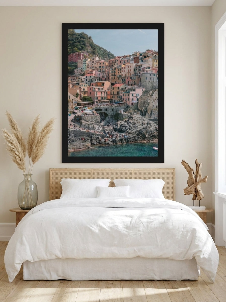 Modern wall art print styled on the wall in a coastal bedroom