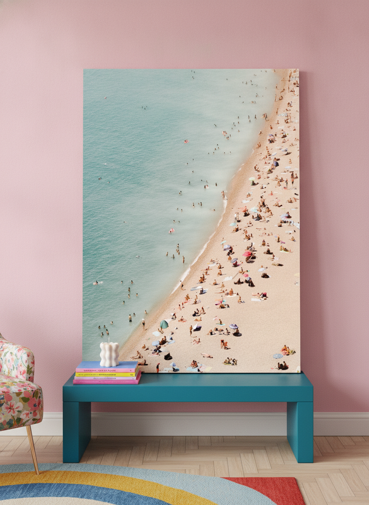 Stretched canvas wall art standing on a side table in a colourful eclectic living room