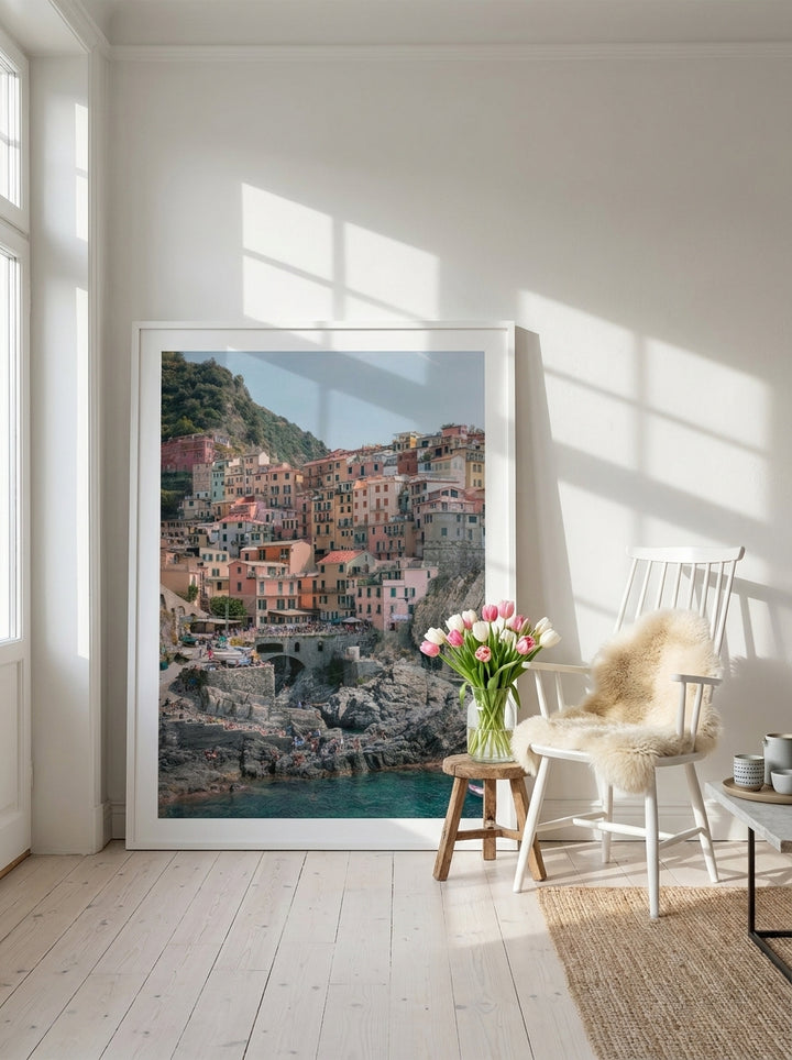 Oversized statement modern wall art print leaning against the wall in a bright Scandinavian living room