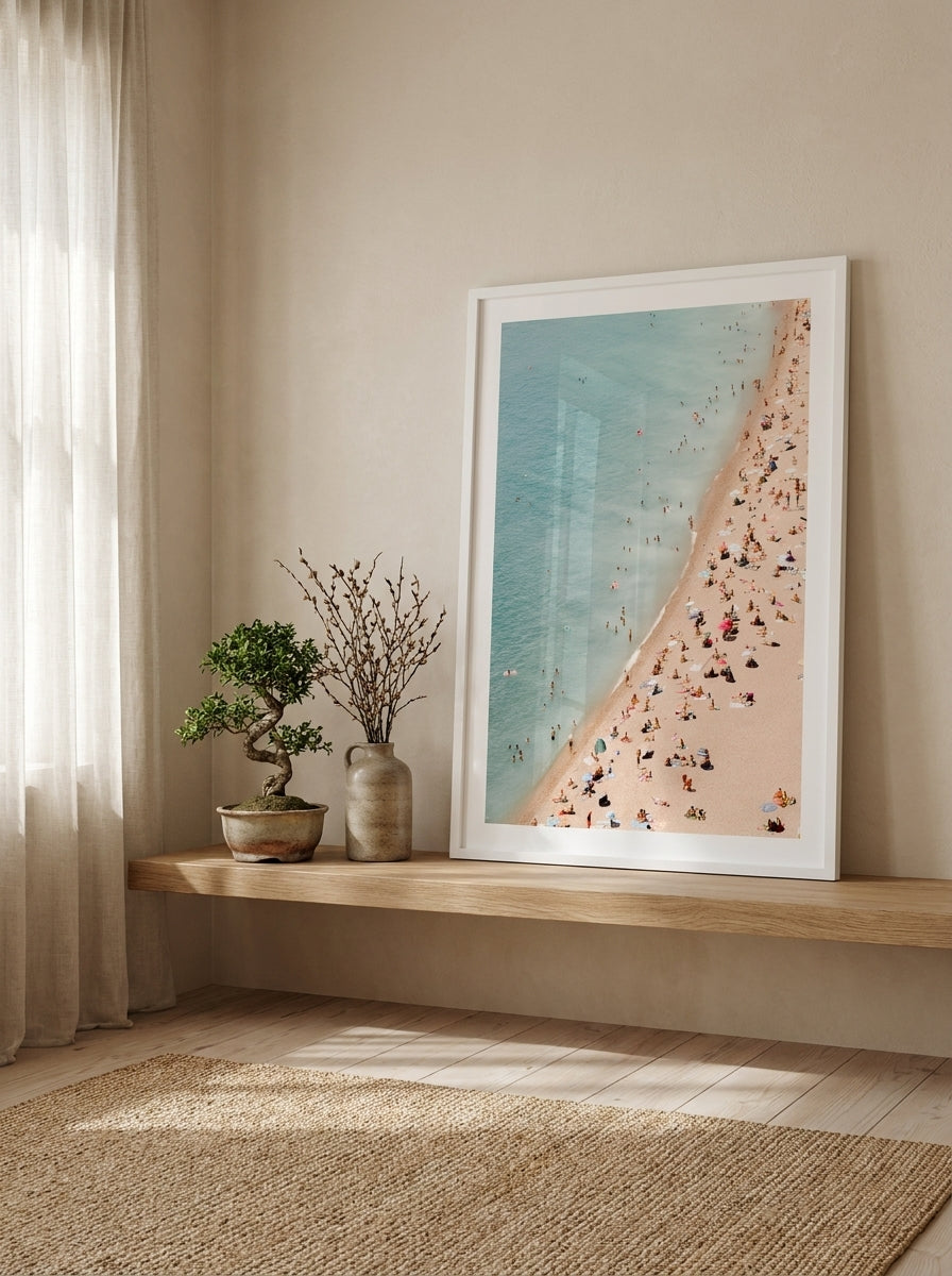 Modern wall art print standing on a shelf in a warm Japandi bedroom