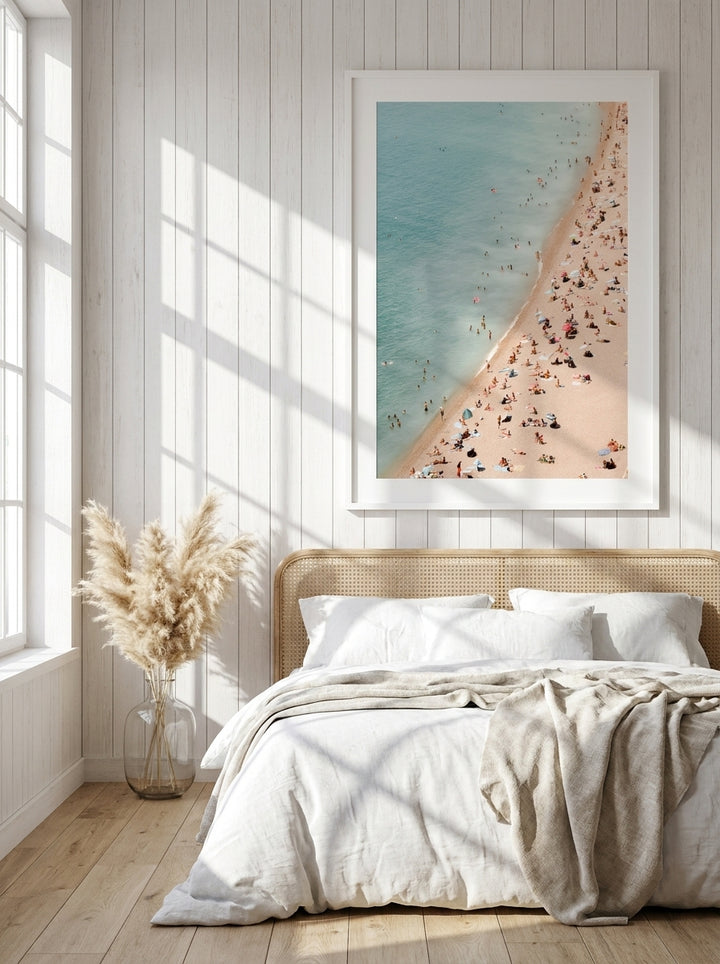 Oversized statement modern wall art print styled on the wall in a coastal bedroom