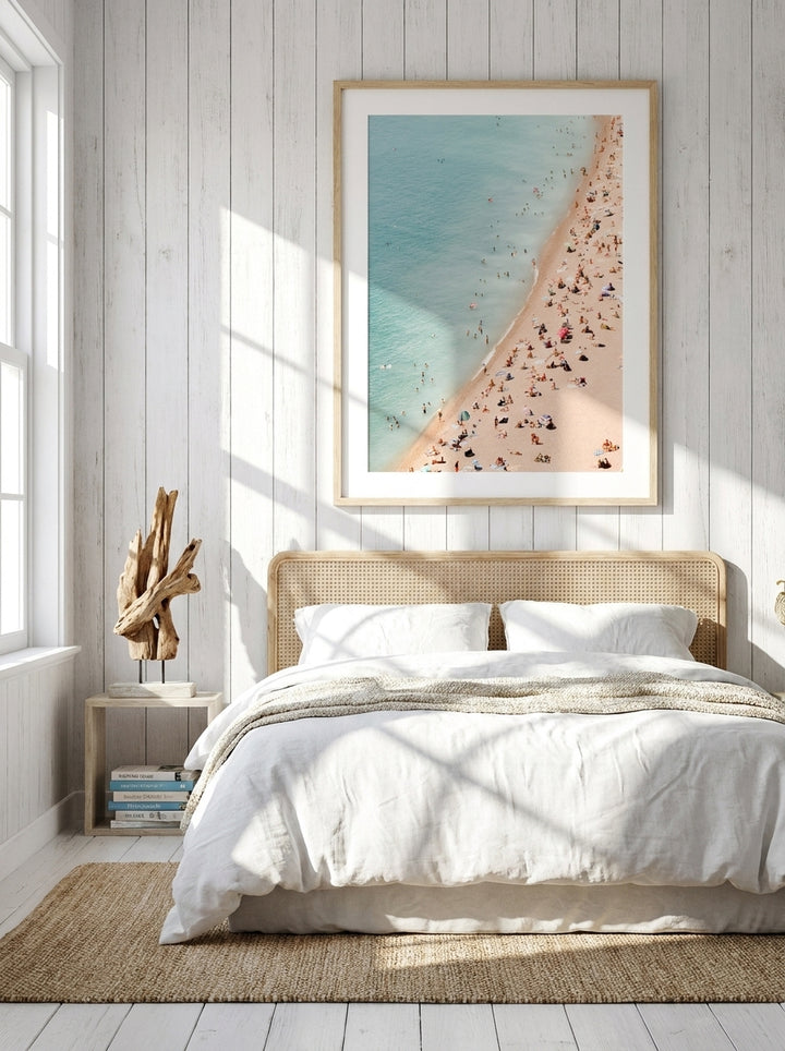 Modern wall art print styled on the wall in a coastal bedroom