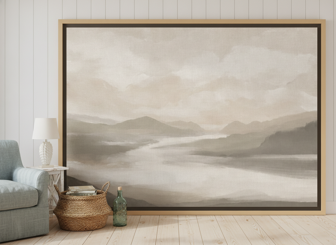 Oversized statement canvas wall art with a natural timber surround leaning against the wall in a coastal dining room