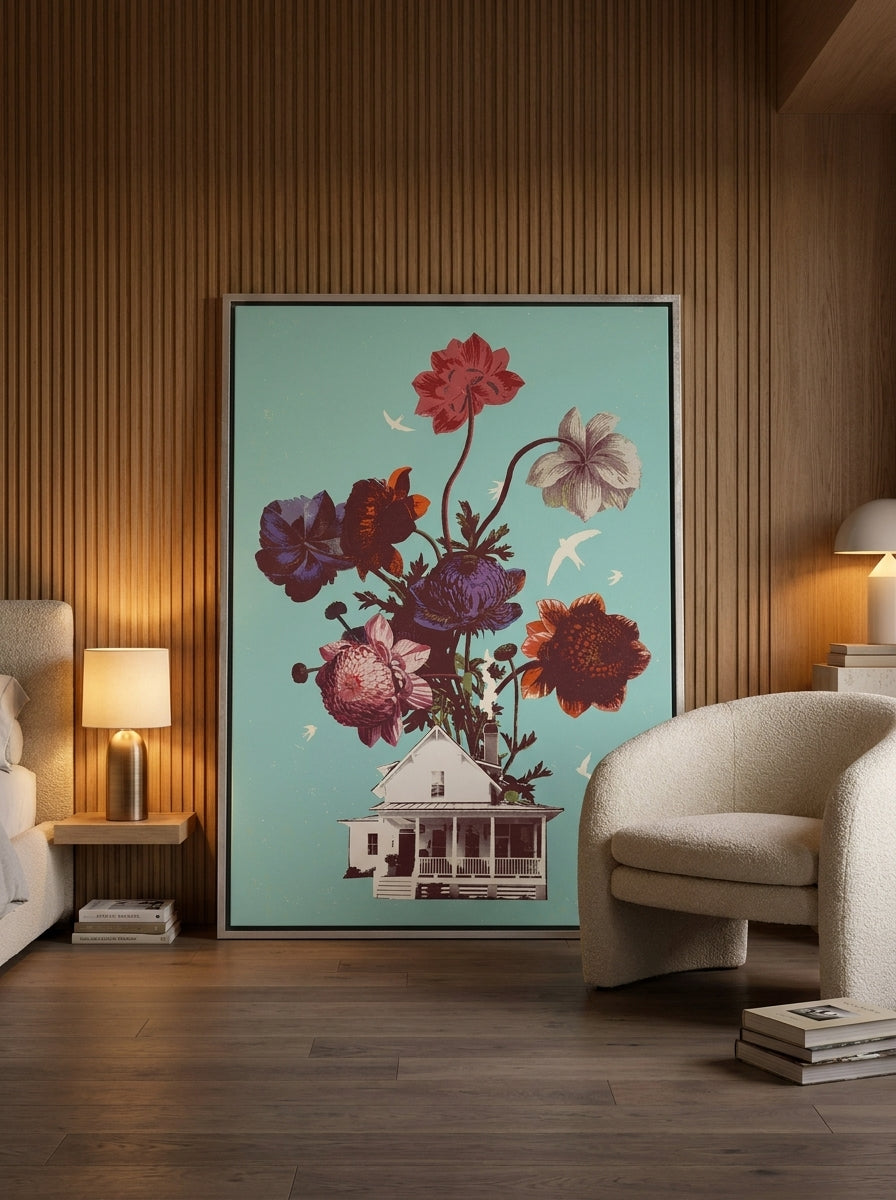 Canvas wall art with a silver leaf surround leaning against the wall in a luxe bedroom
