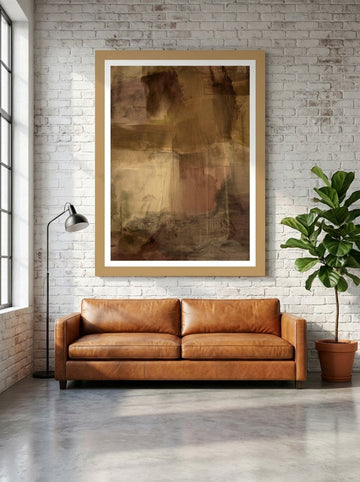Modern wall art print styled on the wall in an industrial loft living room