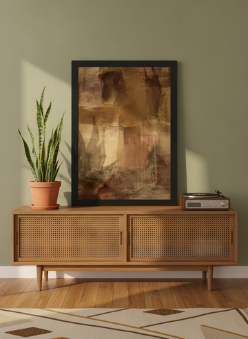 Modern wall art print standing on a sideboard in a mid-century living room