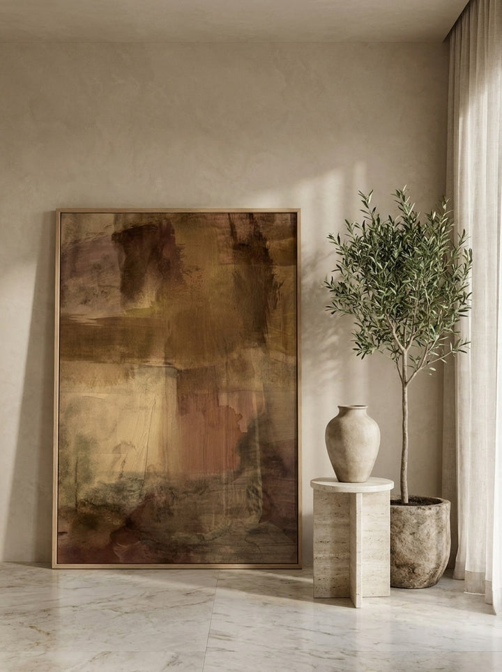 Oversized statement modern wall art print leaning against the wall in a luxe bedroom