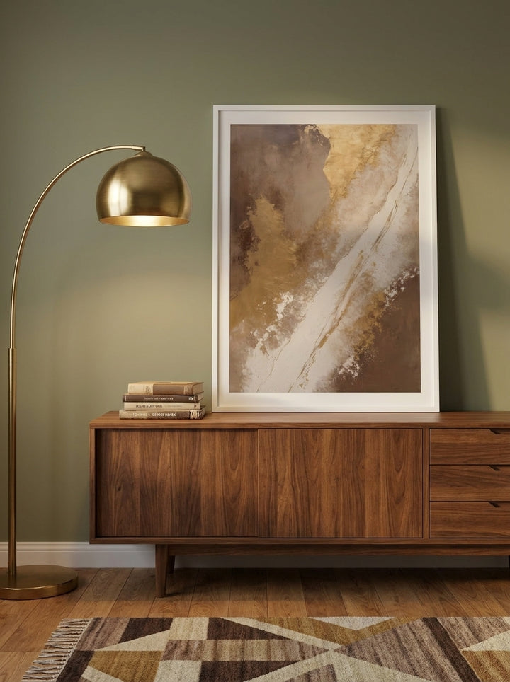 Modern wall art print standing on a sideboard in a mid-century bedroom